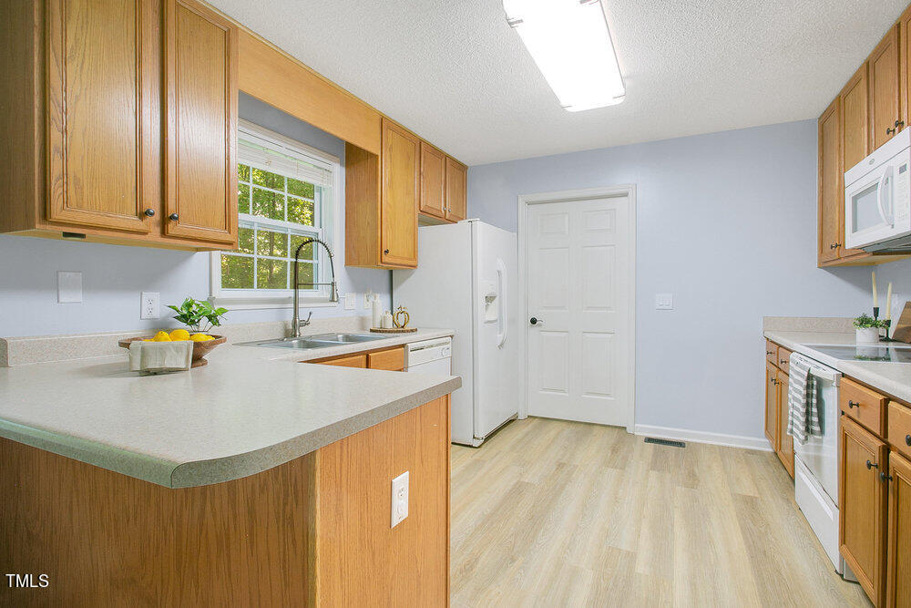 6205 Silver Spring Court Willow Spring, NC 27592 - Photo 10 of 32 Kitchen 2