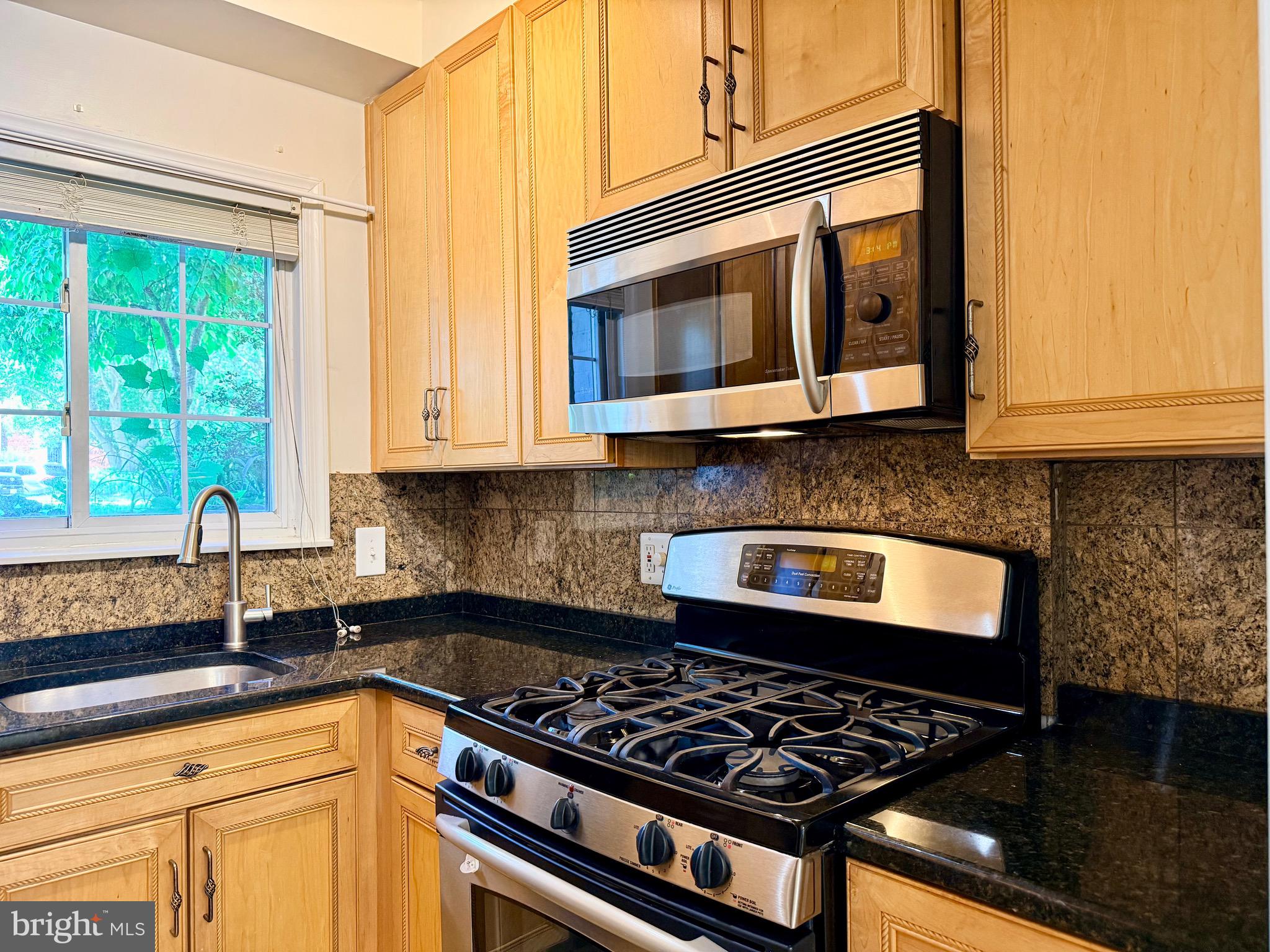 1628 Ripon Place Alexandria, VA 22302 - Photo 7 of 21 Renovated kitchen with granite counters