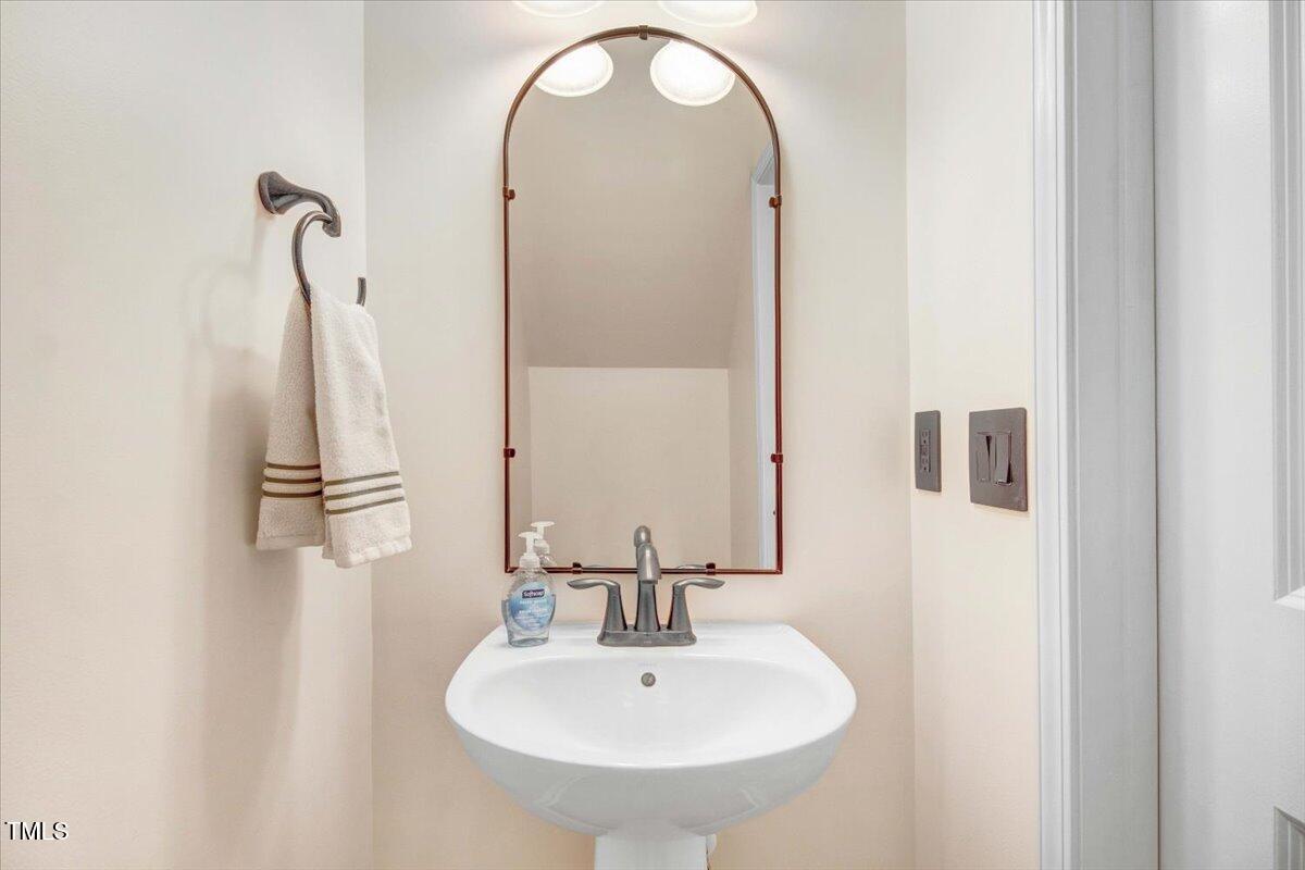 736 Wickham Ridge Road Apex, NC 27539 - Photo 14 of 41 Downstairs bathroom