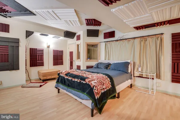 a bed room with a bed and a couch