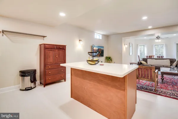 a view of living room with furniture and a table