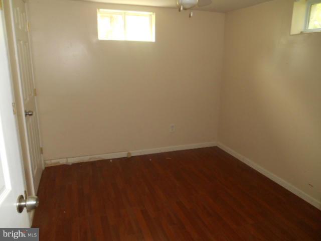 1406 Larch Road Severn, MD 21144 - Photo 12 of 15 an empty room with a window