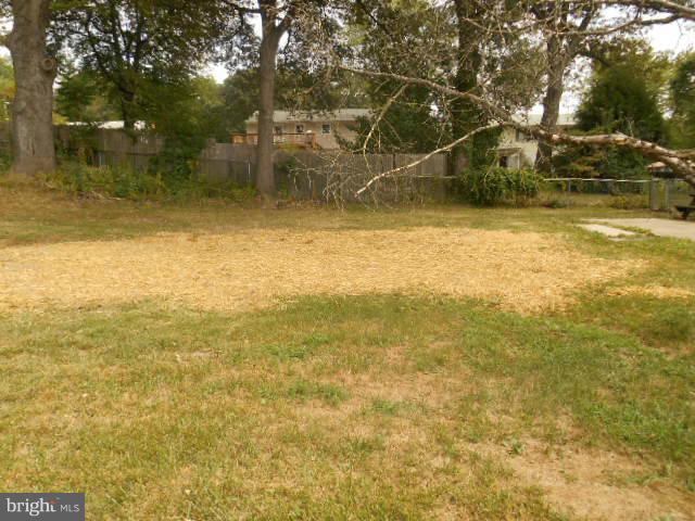 1406 Larch Road Severn, MD 21144 - Photo 14 of 15 a view of a yard with a house