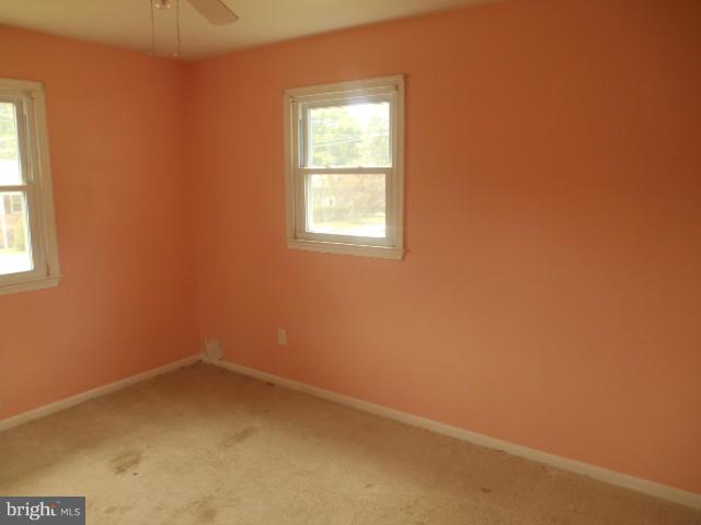 1406 Larch Road Severn, MD 21144 - Photo 6 of 15 an empty room with a window
