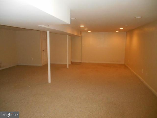 1406 Larch Road Severn, MD 21144 - Photo 9 of 15 an empty room with an empty space