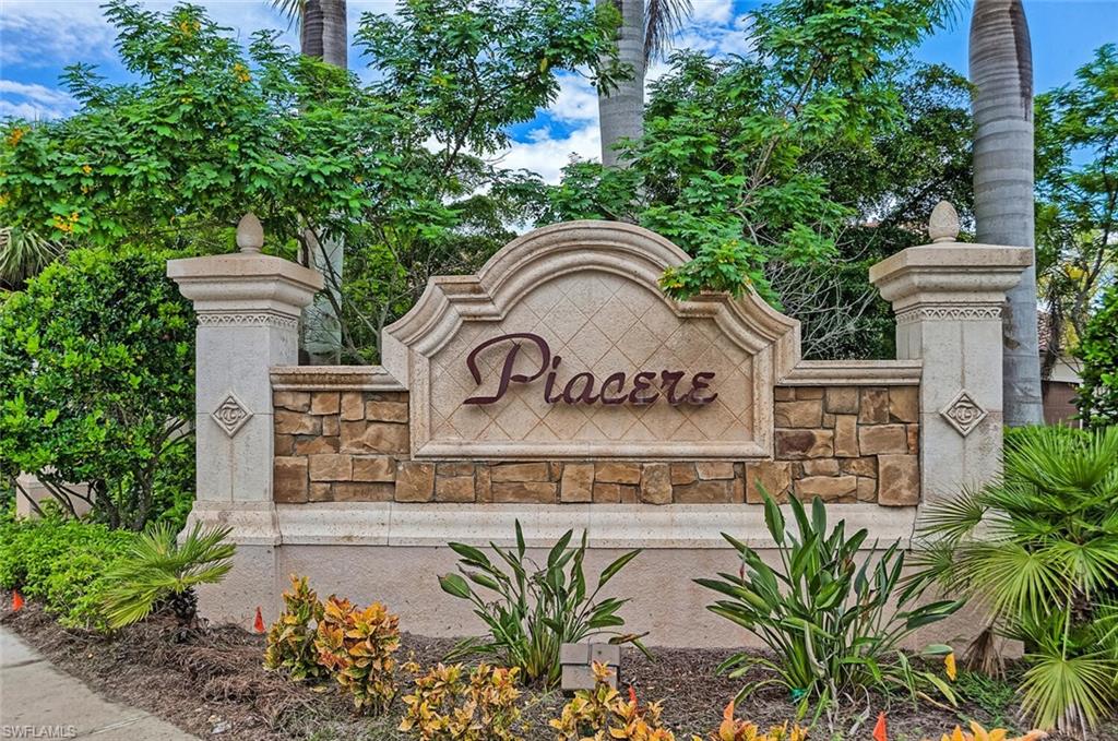 9415 Piacere Way Naples, FL 34113 - Photo 25 of 35 a sign that is on the side of a building