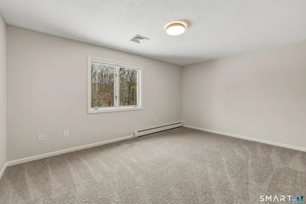 an empty room with a window