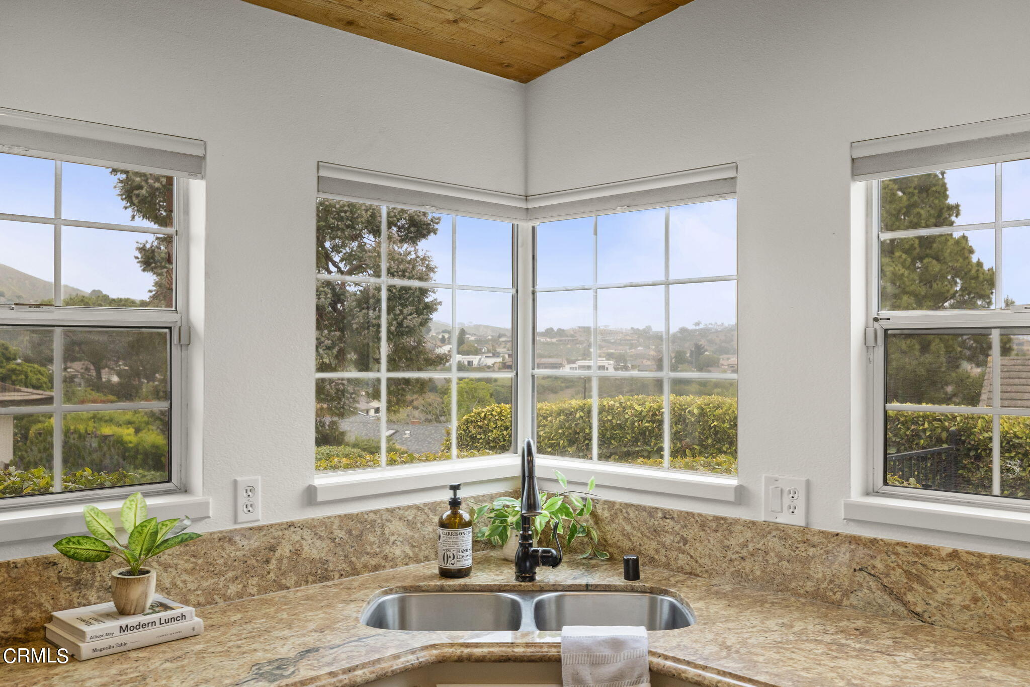 116 Via Pasito Ventura, CA 93003 - Photo 23 of 61 a bathroom with a granite countertop window and a sink
