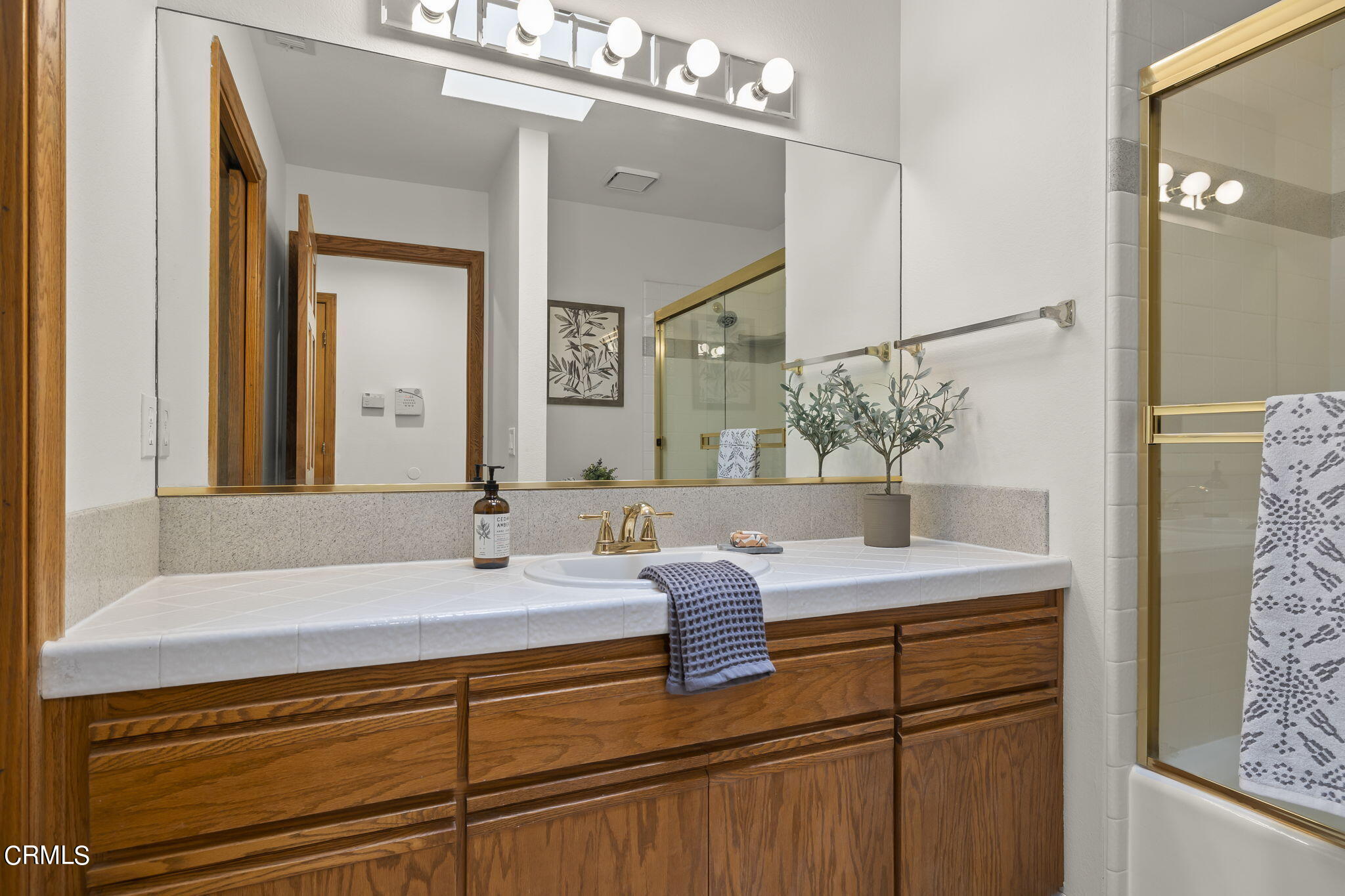 116 Via Pasito Ventura, CA 93003 - Photo 37 of 61 a bathroom with a sink and a mirror