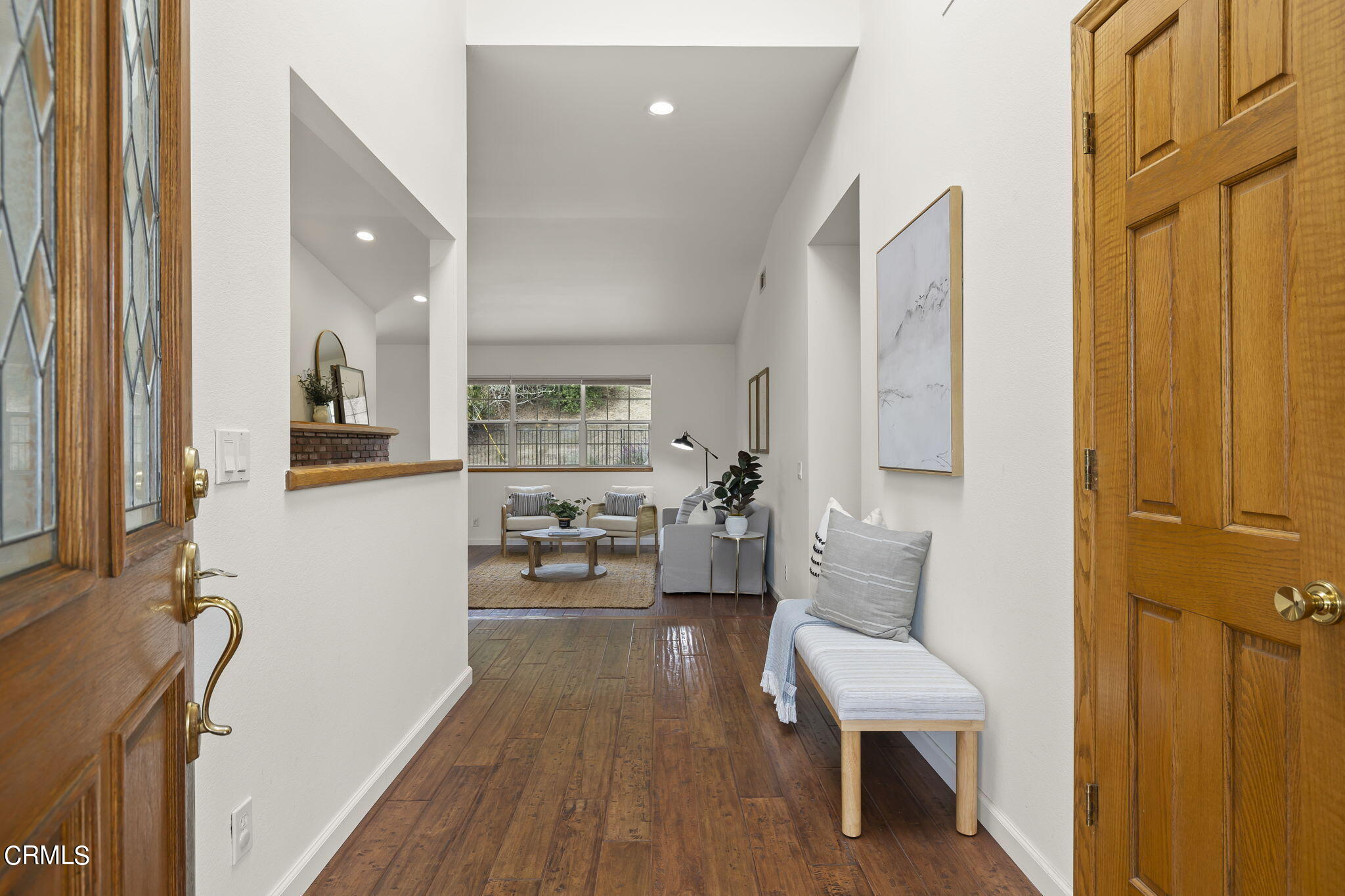 116 Via Pasito Ventura, CA 93003 - Photo 6 of 61 a living room with furniture and a wooden floor