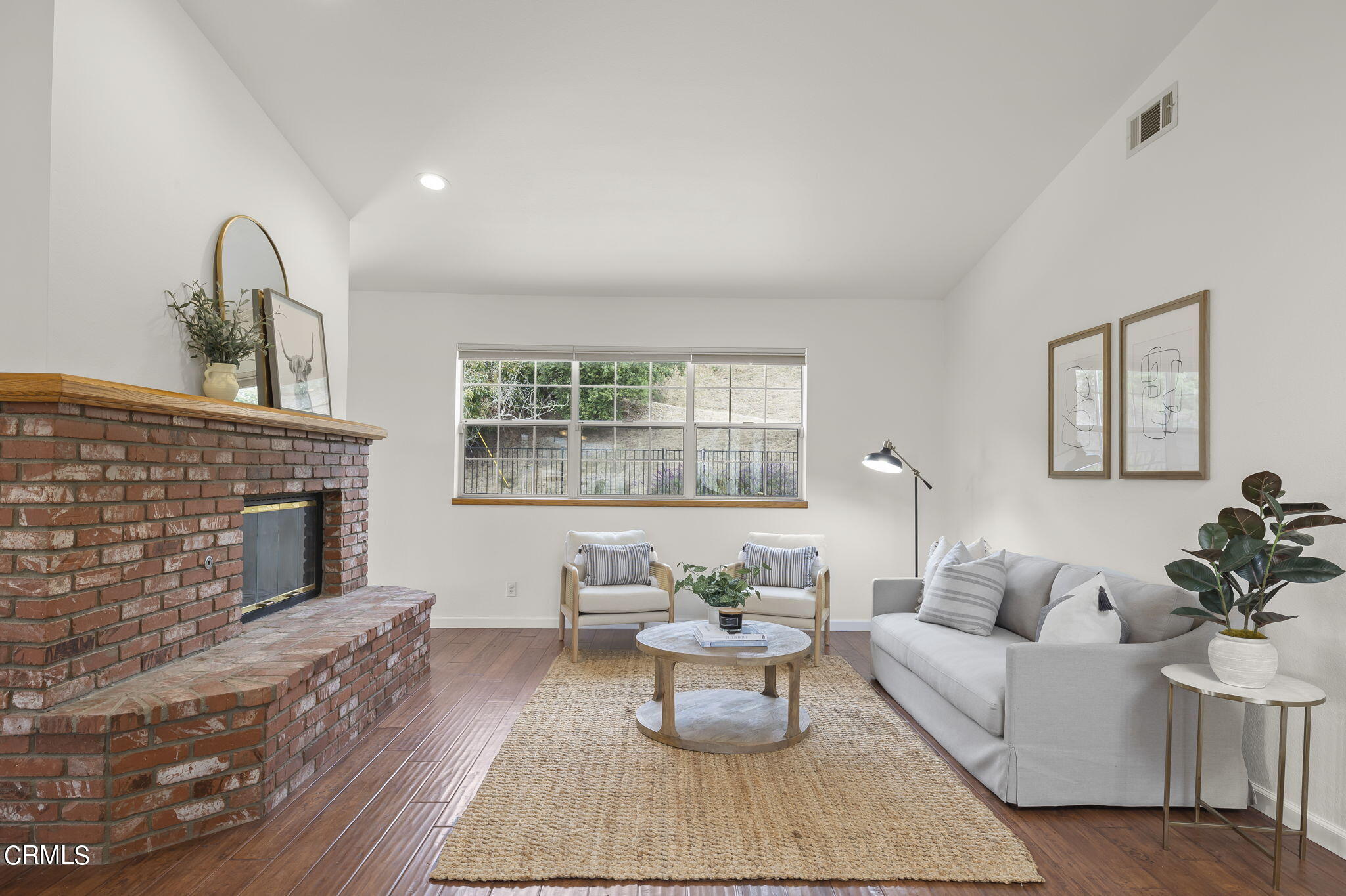 116 Via Pasito Ventura, CA 93003 - Photo 9 of 61 a living room with furniture and a fireplace