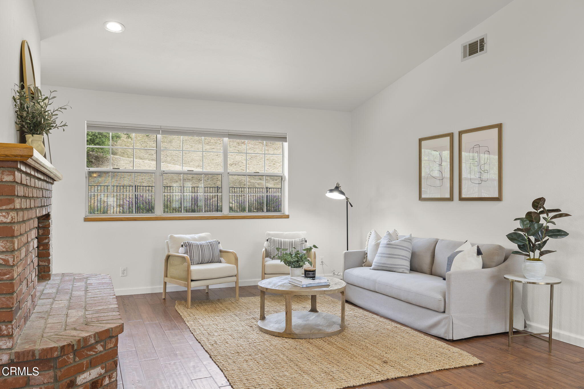 116 Via Pasito Ventura, CA 93003 - Photo 10 of 61 a living room with furniture and a large window