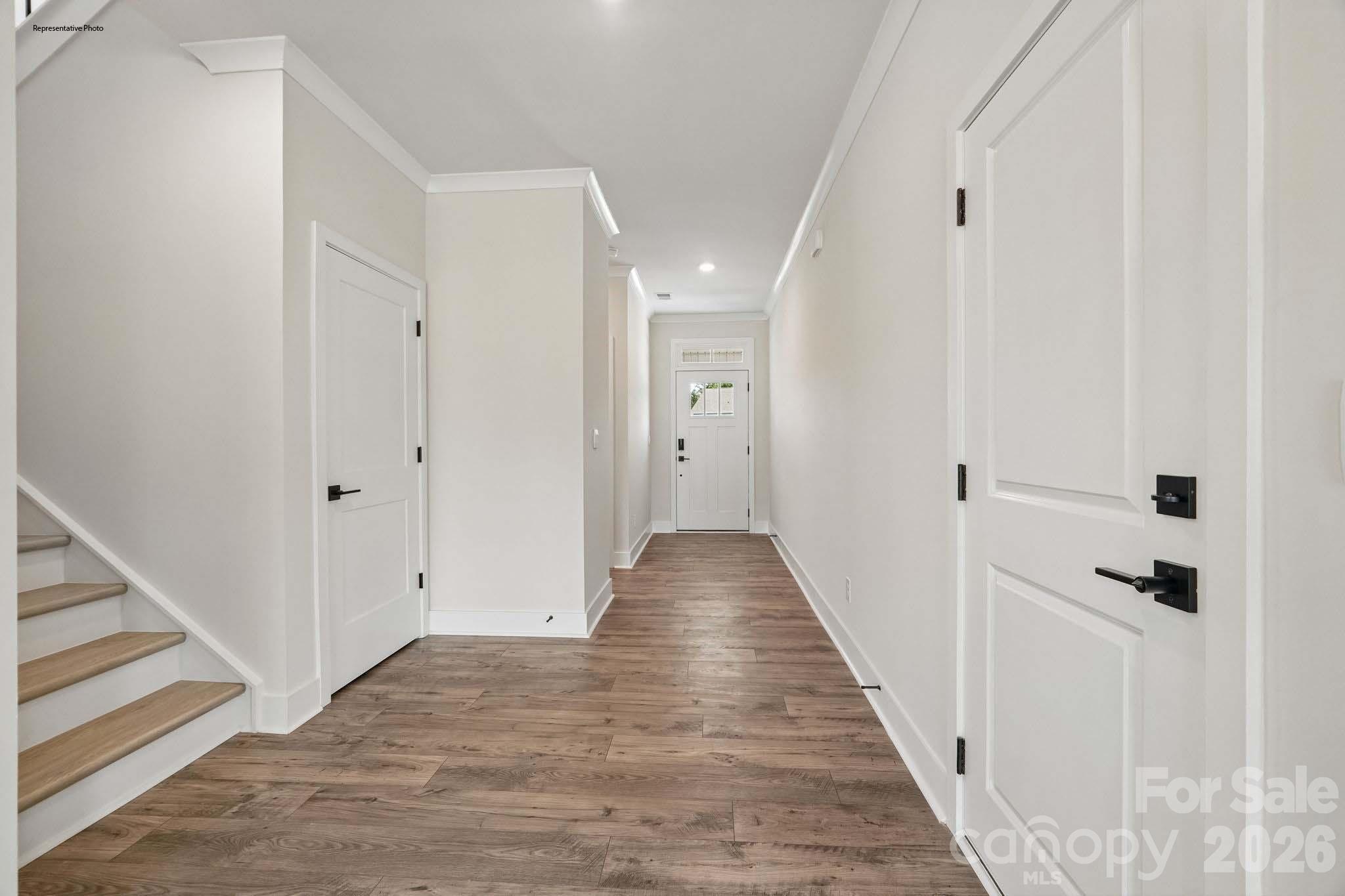 541 Mahogany Road York, SC 29745 - Photo 6 of 32 a view of a hallway with wooden floor and entryway