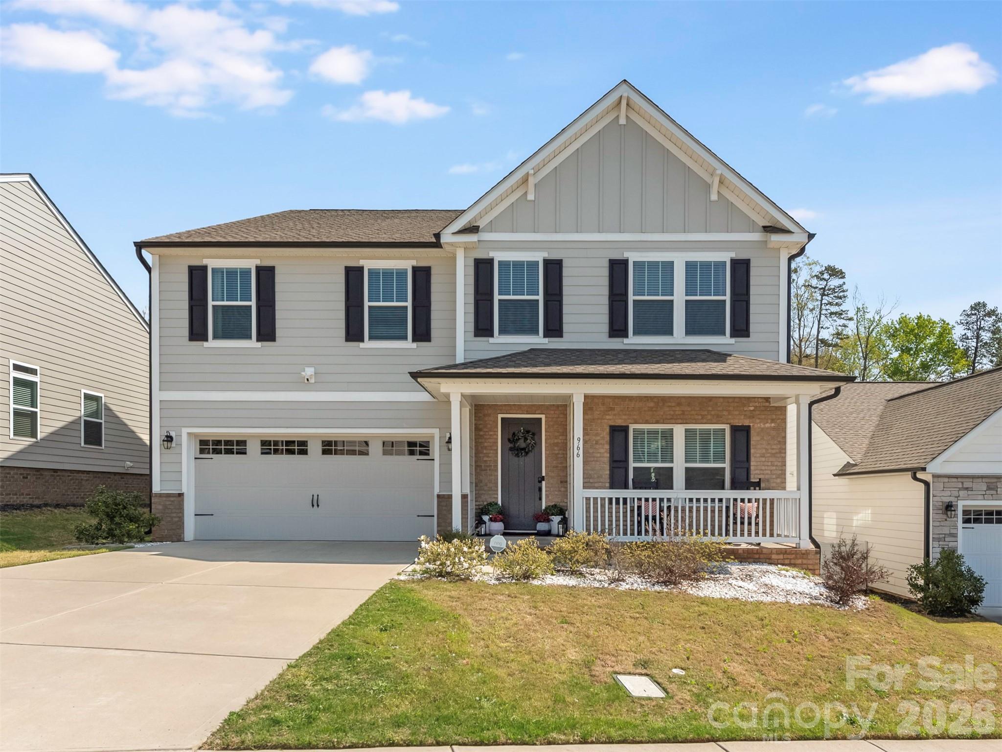 966 Scotch Meadows Loop Monroe, NC 28110 - Photo 1 of 48 a front view of a house with a yard
