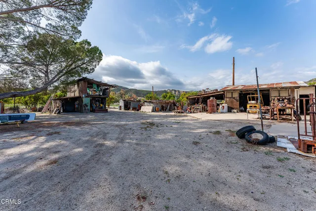 a view of a park with swings and slides