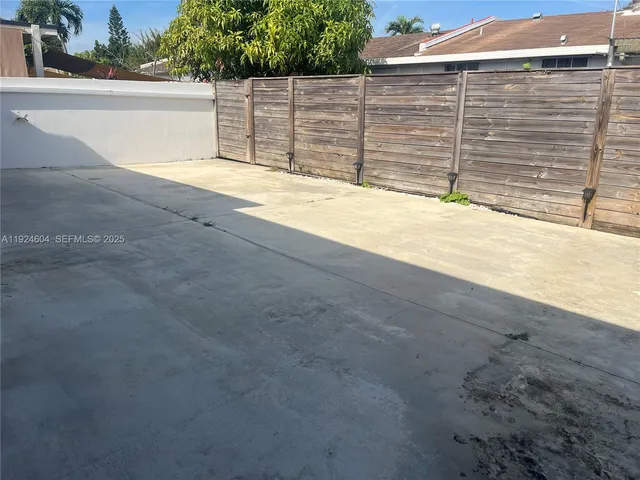 a view of a backyard space