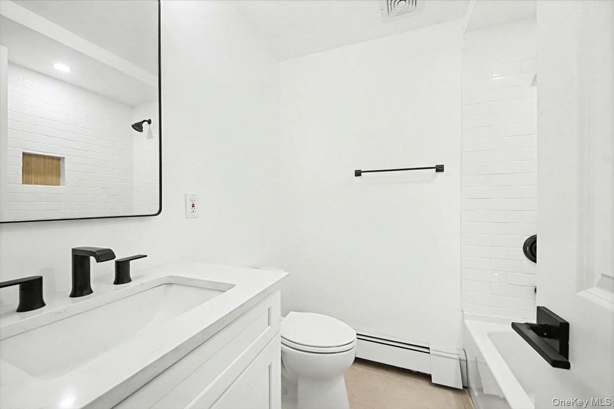 366 Overlook Road Pleasant Valley, NY 12569 - Photo 28 of 39 a bathroom with a sink a toilet and mirror