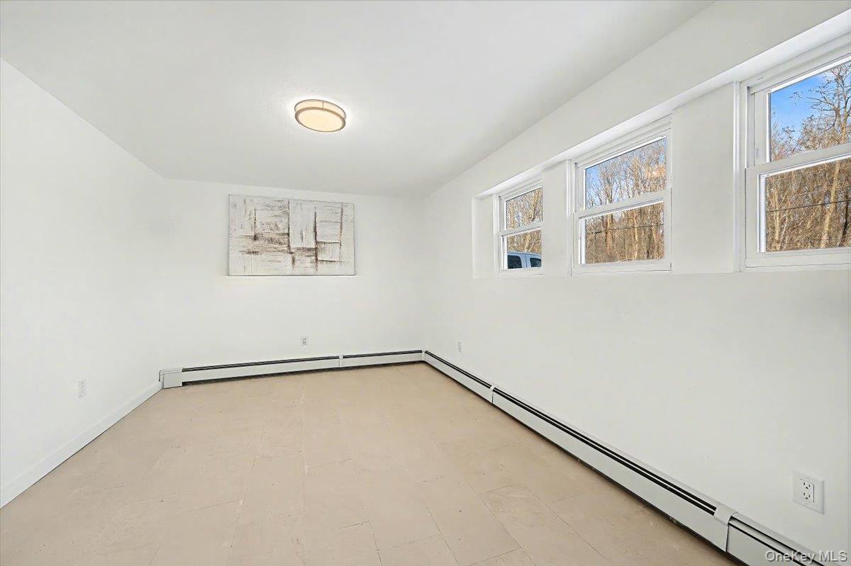 366 Overlook Road Pleasant Valley, NY 12569 - Photo 29 of 39 an empty room with windows