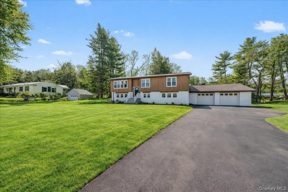 366 Overlook Road Pleasant Valley, NY 12569 - Photo 3 of 39 a view of a house with garden and a trees