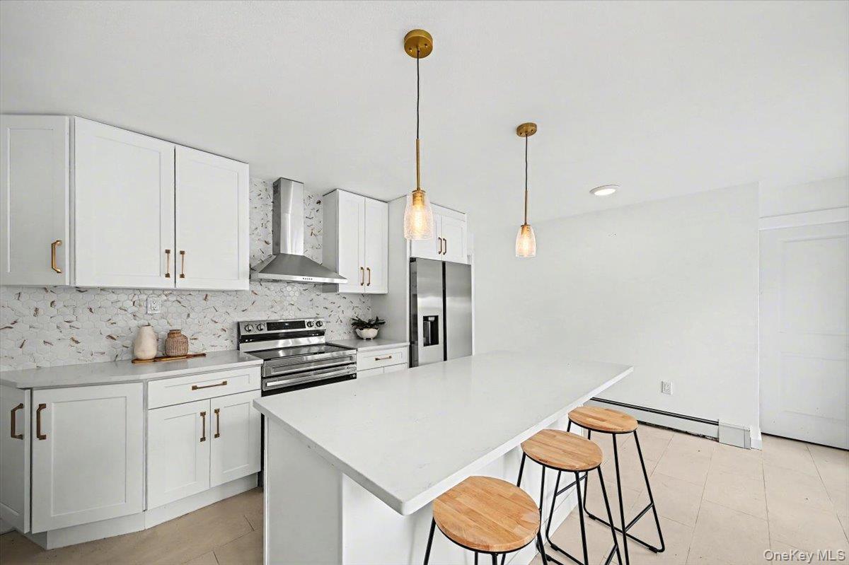 366 Overlook Road Pleasant Valley, NY 12569 - Photo 33 of 39 a kitchen with white cabinets and white appliances