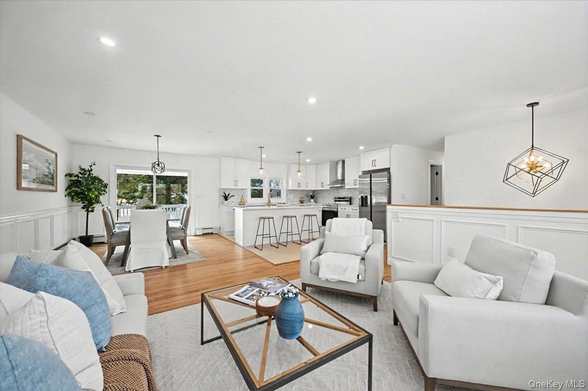 366 Overlook Road Pleasant Valley, NY 12569 - Photo 6 of 39 a living room with furniture and a chandelier