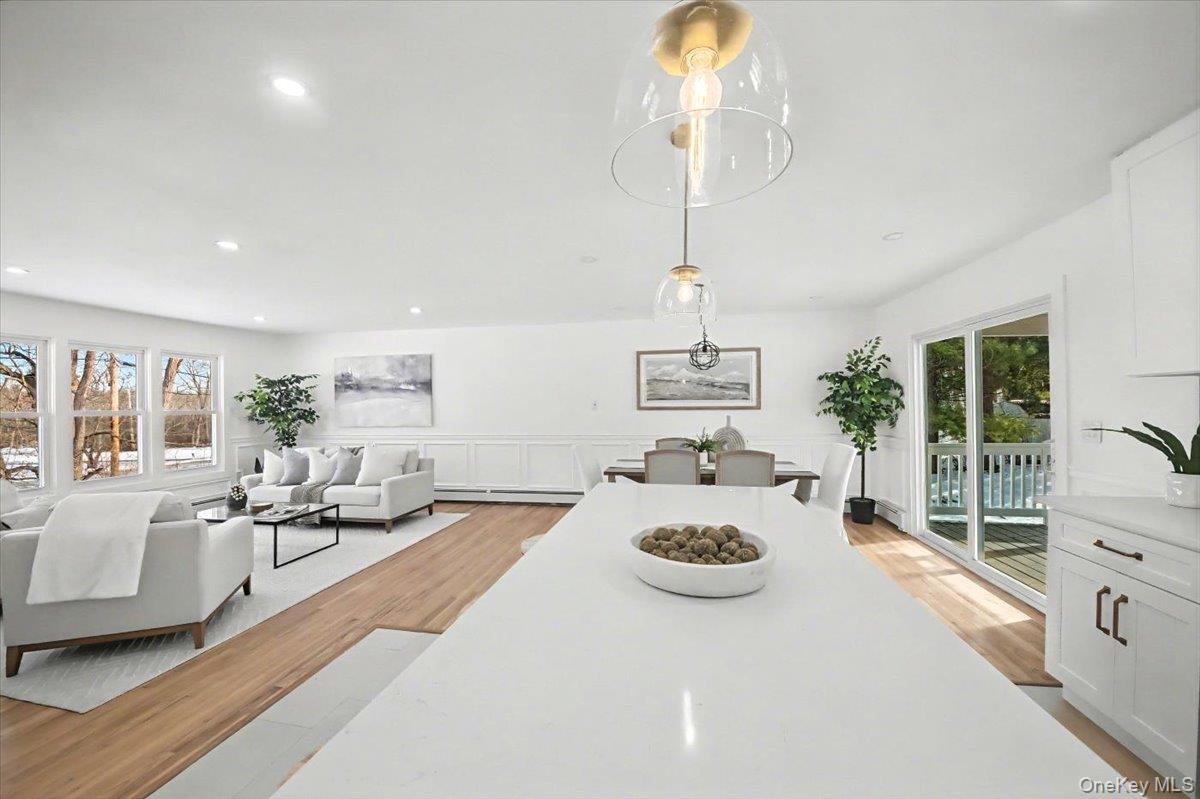 366 Overlook Road Pleasant Valley, NY 12569 - Photo 10 of 39 a living room with furniture and a chandelier