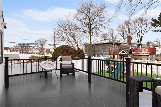 a view of a patio with a yard
