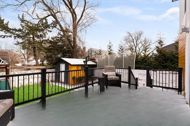 a view of a patio with a yard