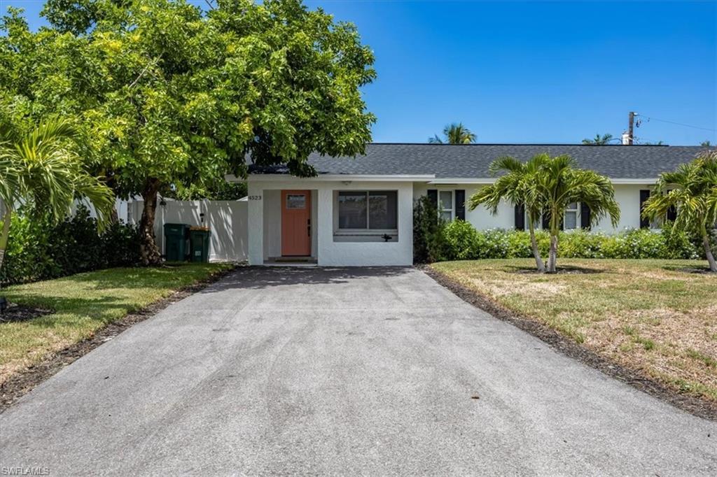 front view of house with a yard
