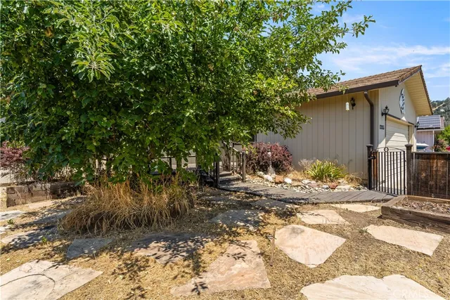 a view of a house with brick walls