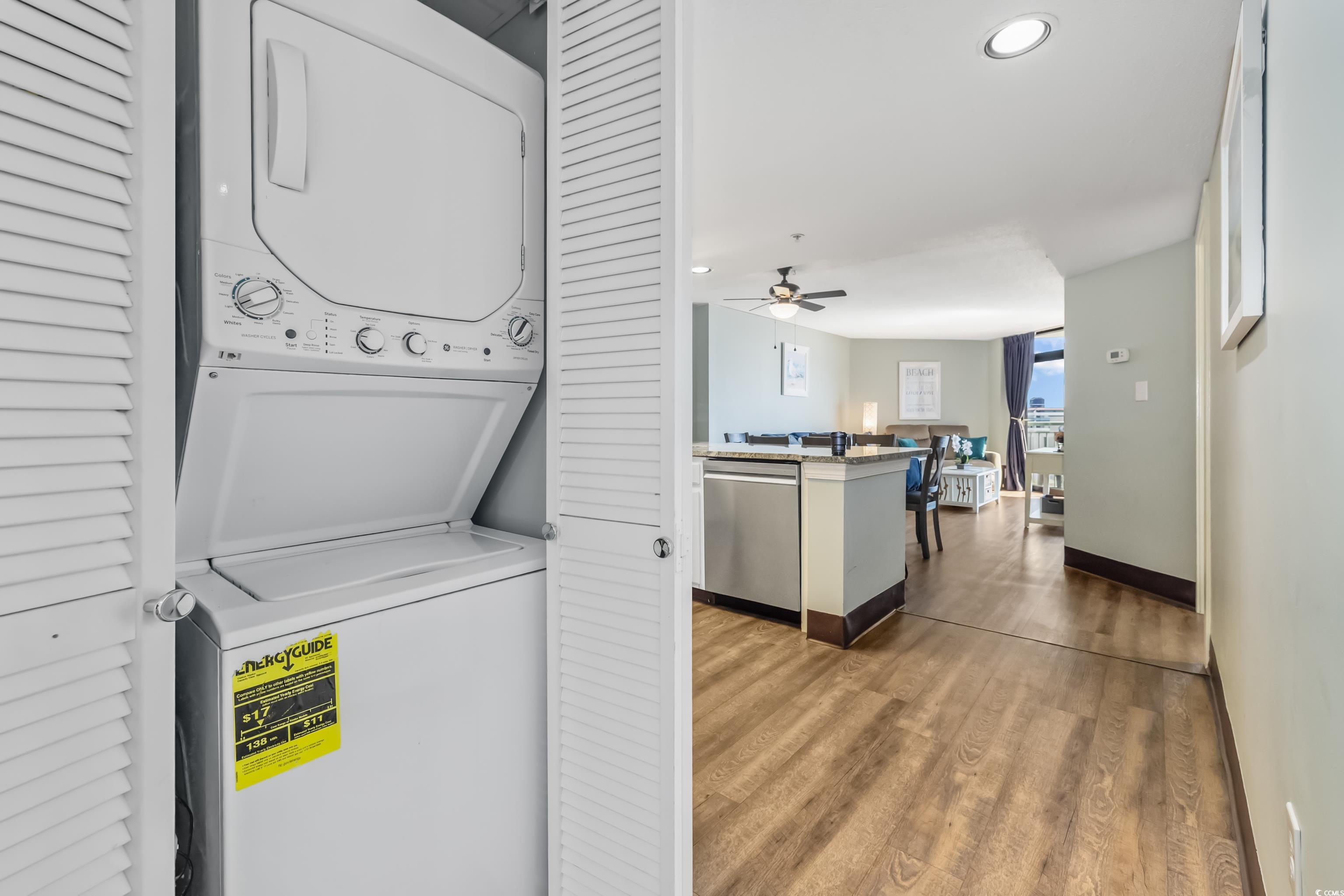 205 74th Avenue North, Unit 1104 Myrtle Beach, SC 29572 - Photo 13 of 40 Laundry area with light wood-style floors, estacked washer and dryer, and recessed lighting