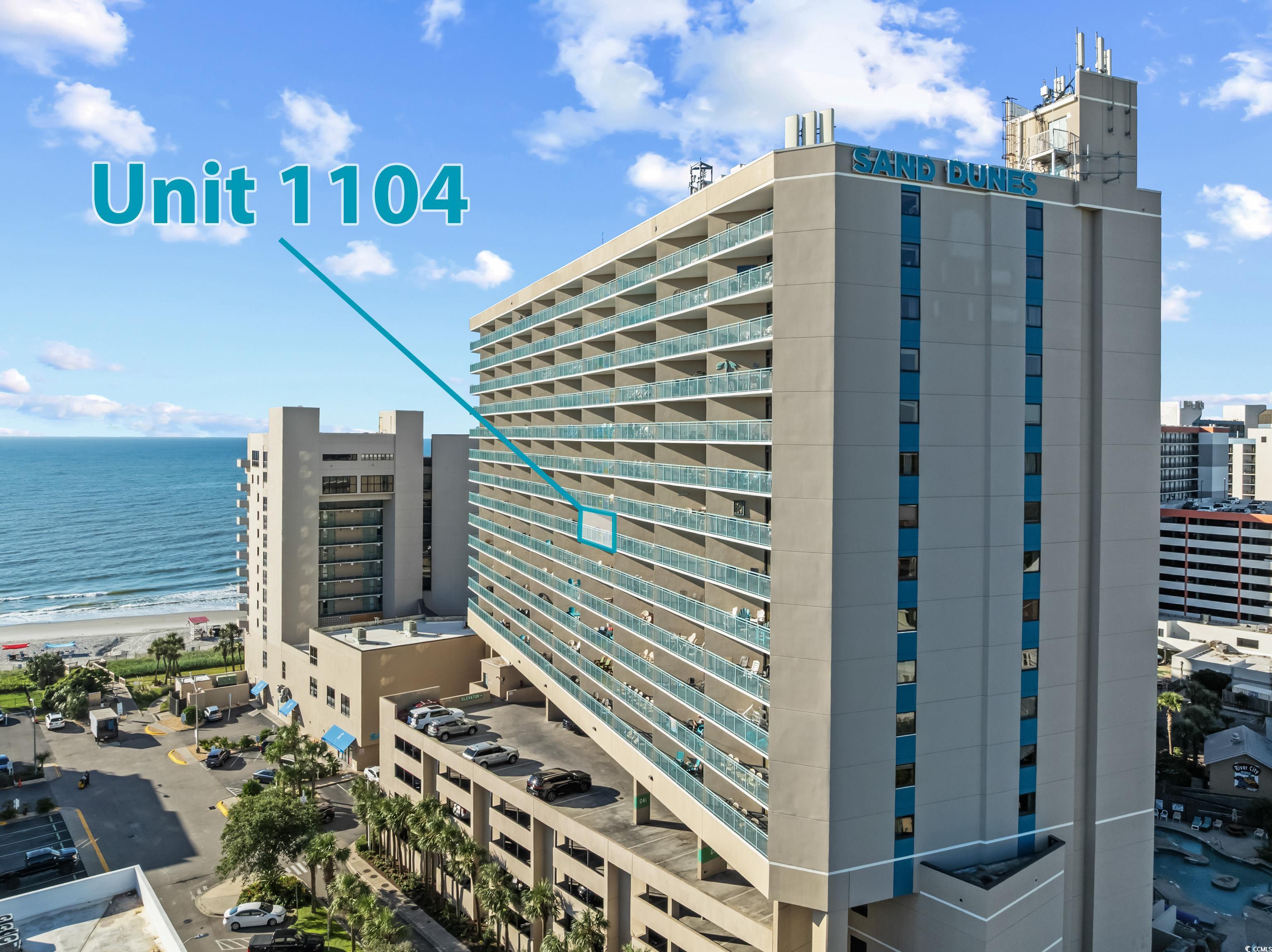 205 74th Avenue North, Unit 1104 Myrtle Beach, SC 29572 - Photo 5 of 40 View of building exterior featuring view of water and beach