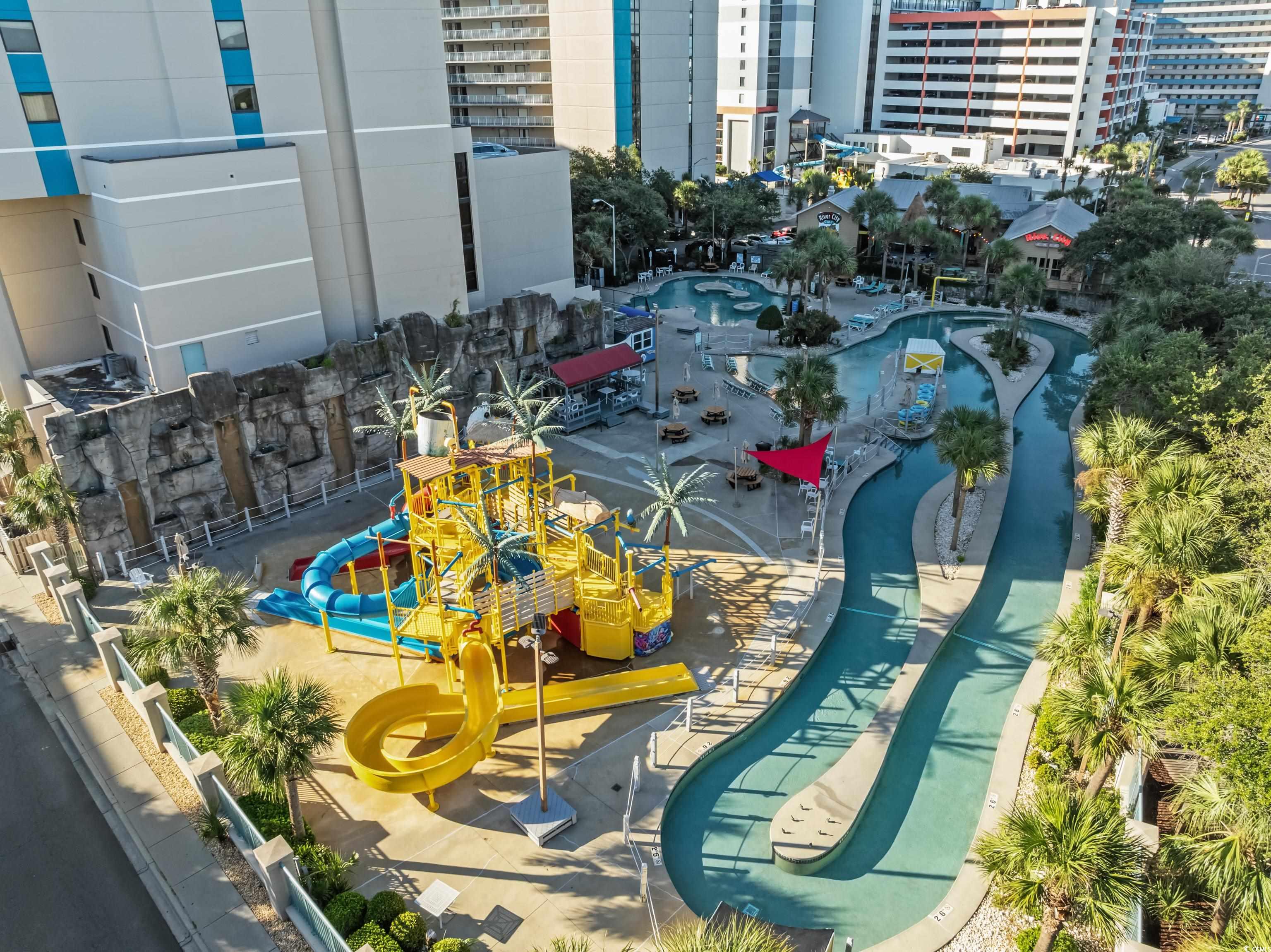 205 74th Avenue North, Unit 1104 Myrtle Beach, SC 29572 - Photo 6 of 40 Exterior space featuring a pool area