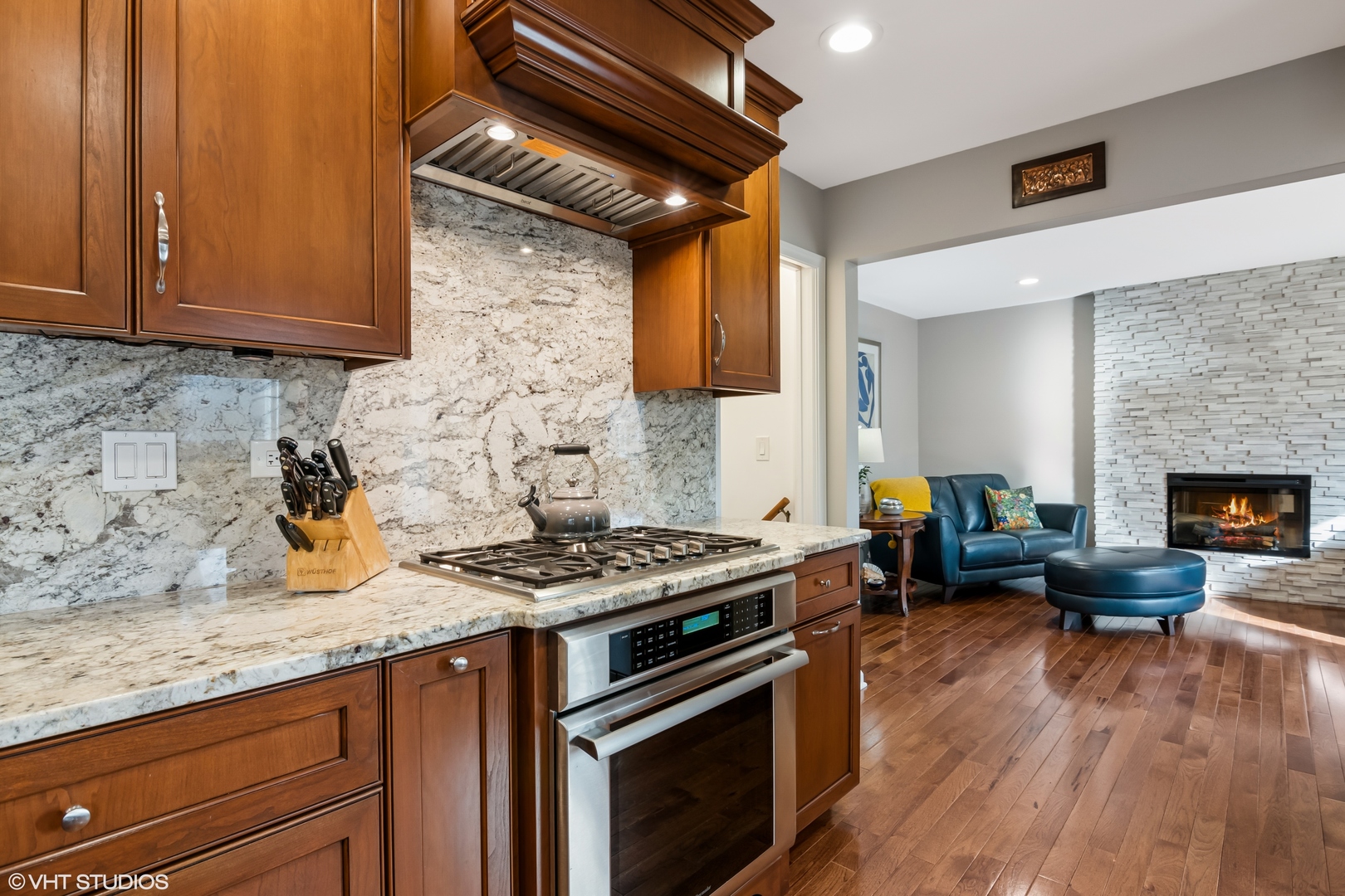 165 Hamilton Lane Wheaton, IL 60189 - Photo 14 of 45 a kitchen with granite countertop stainless steel appliances and wooden cabinets