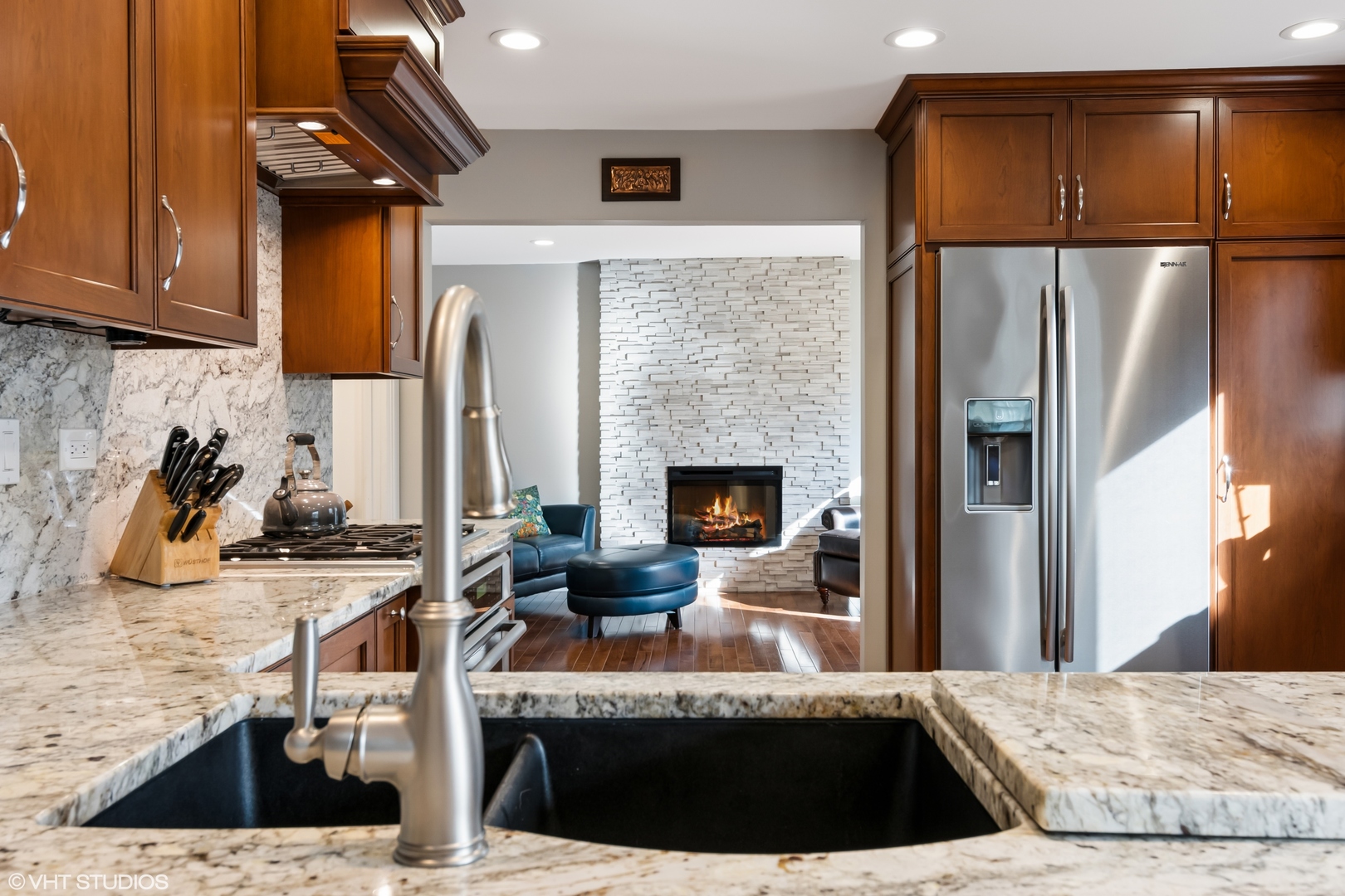 165 Hamilton Lane Wheaton, IL 60189 - Photo 17 of 45 a view of a kitchen with kitchen island a counter top space a sink stainless steel appliances and cabinets