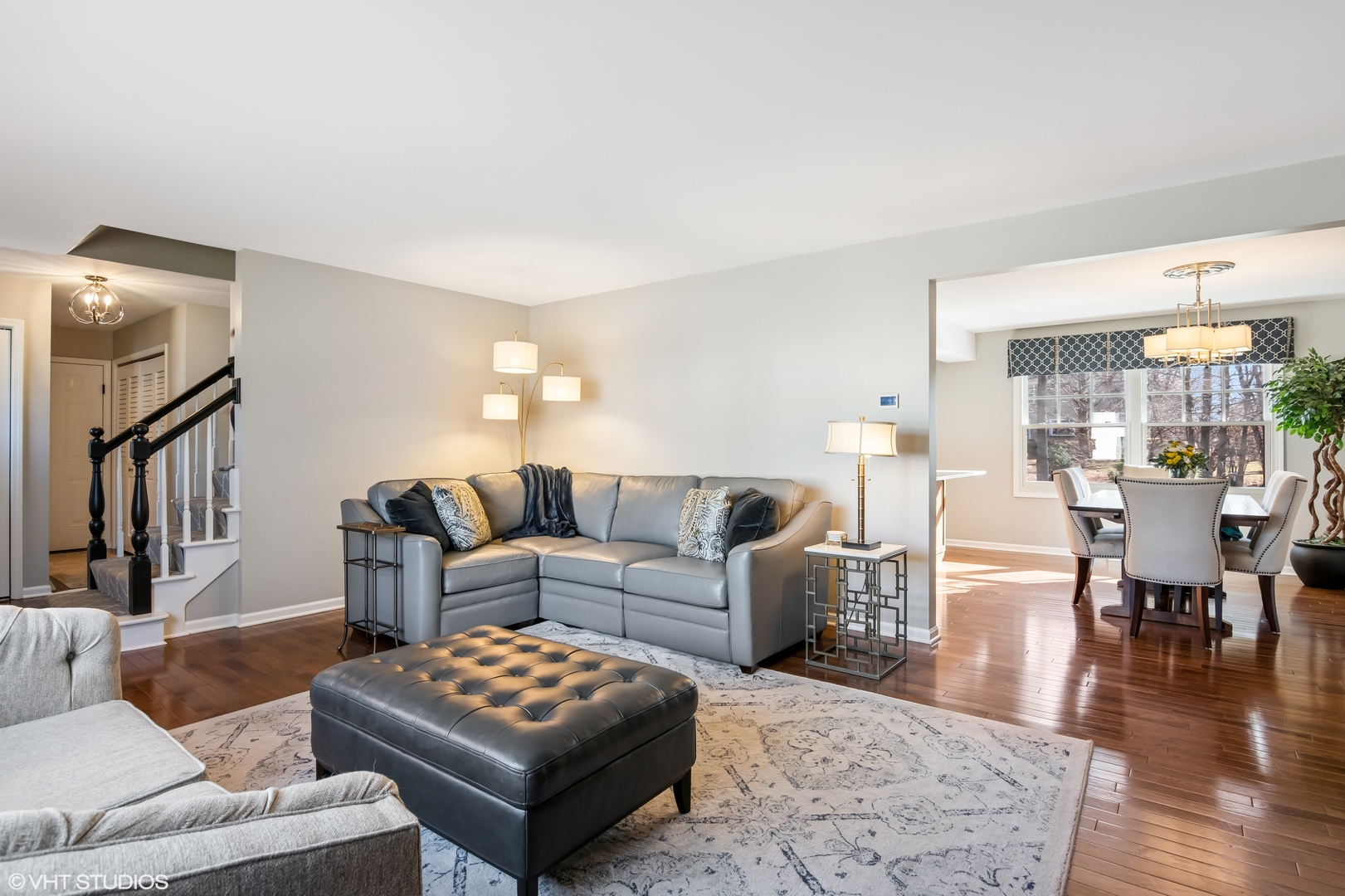165 Hamilton Lane Wheaton, IL 60189 - Photo 7 of 45 a living room with furniture and a wooden floor