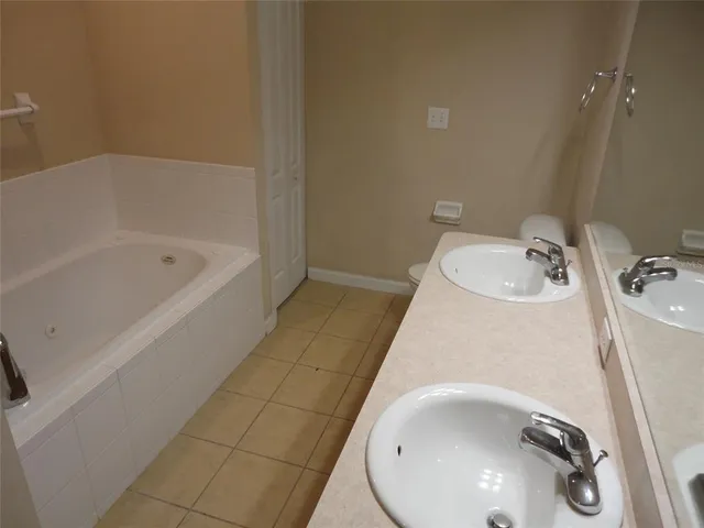 a bathroom with a sink and a tub