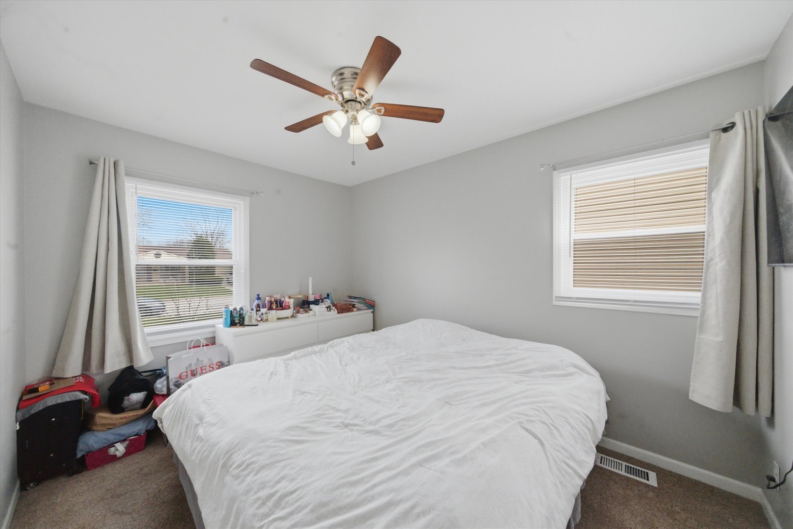 110 Villa Road Streamwood, IL 60107 - Photo 11 of 19 a bedroom with a bed and a window
