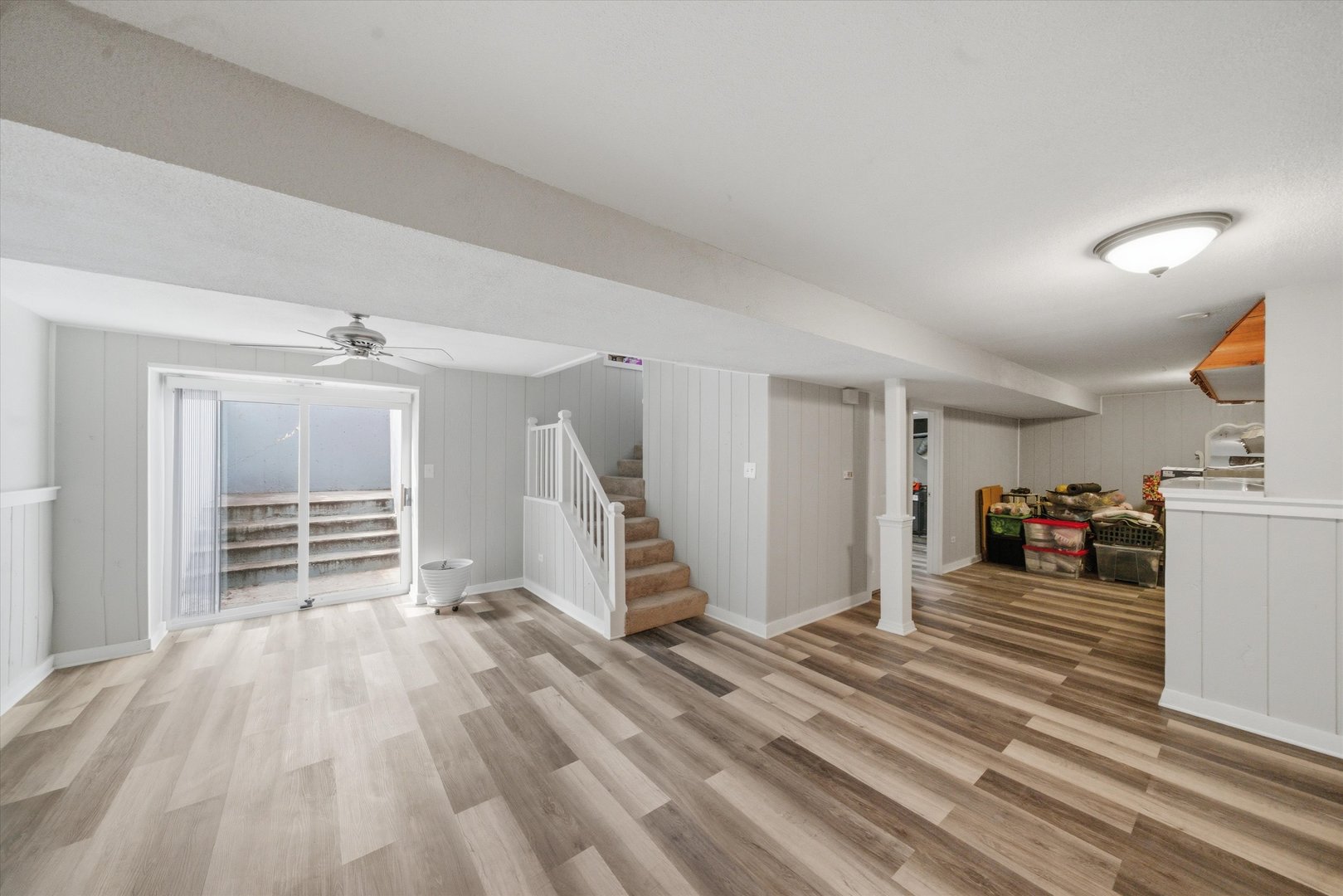 110 Villa Road Streamwood, IL 60107 - Photo 14 of 19 a view of a livingroom with furniture and a ceiling fan