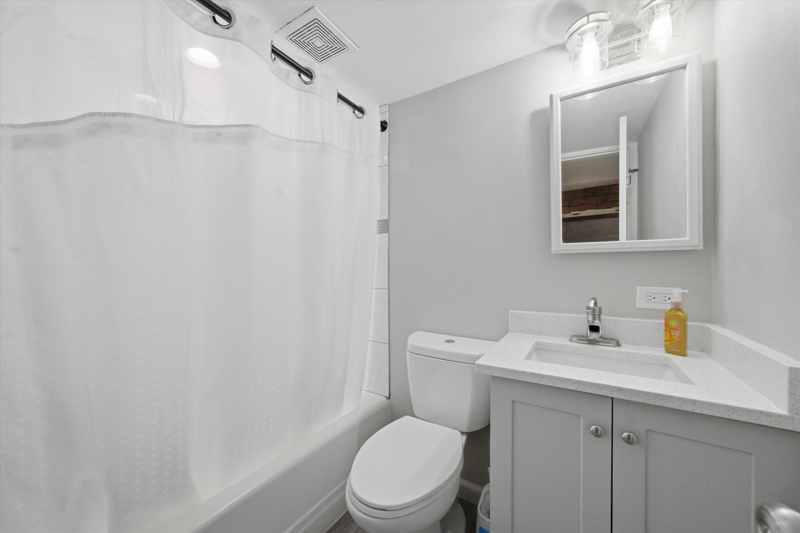 110 Villa Road Streamwood, IL 60107 - Photo 7 of 19 a bathroom with a sink a toilet and shower
