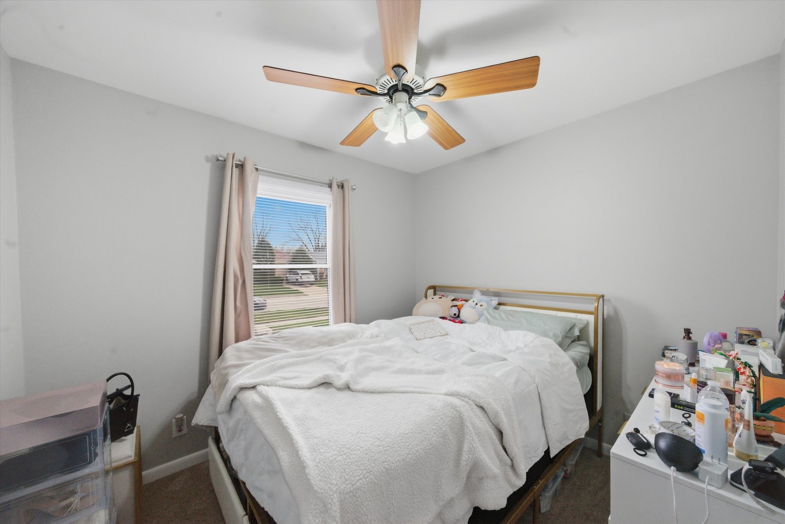 110 Villa Road Streamwood, IL 60107 - Photo 9 of 19 a bedroom with a bed and a chandelier