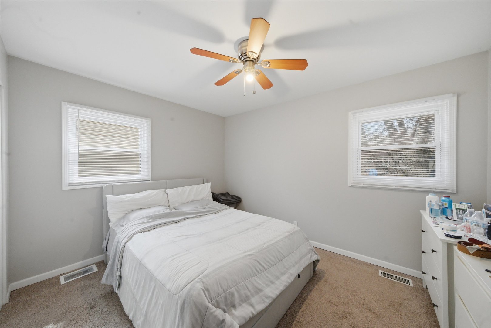 110 Villa Road Streamwood, IL 60107 - Photo 10 of 19 a bedroom with a bed and a window