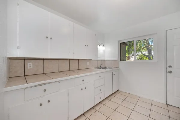 a view of a kitchen with window