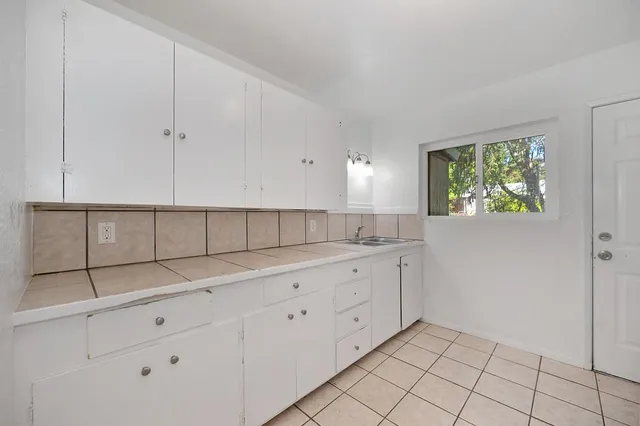 a view of a kitchen with window