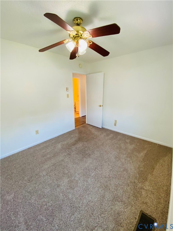 3408 Shady Creek Road North Chesterfield, VA 23234 - Photo 19 of 29 an empty room with a ceiling fan and a window