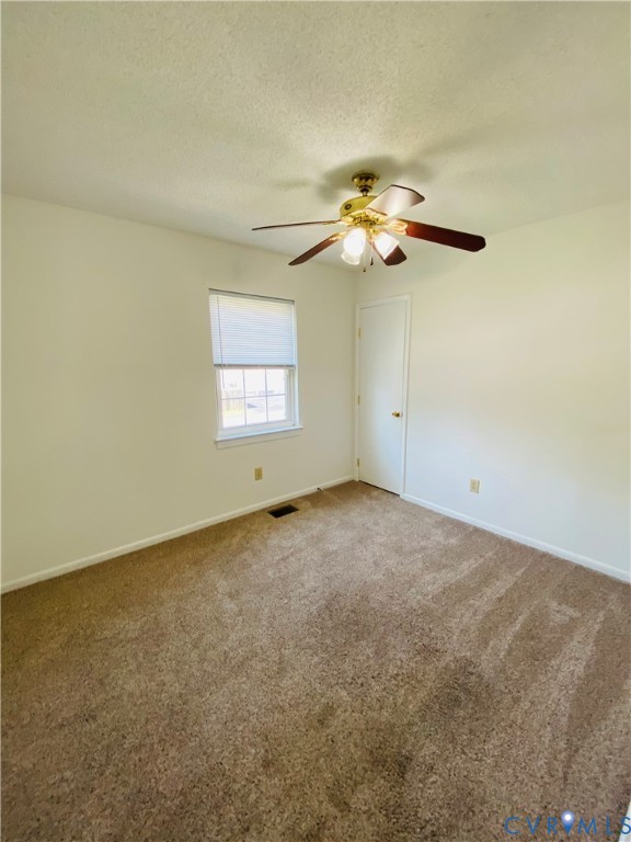 3408 Shady Creek Road North Chesterfield, VA 23234 - Photo 20 of 29 a view of a big room with windows and chandelier fan