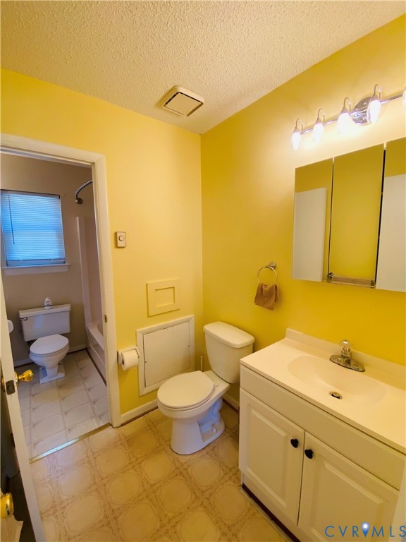 3408 Shady Creek Road North Chesterfield, VA 23234 - Photo 23 of 29 a bathroom with a granite countertop toilet sink and mirror