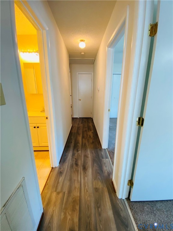 3408 Shady Creek Road North Chesterfield, VA 23234 - Photo 24 of 29 a view of a hallway with wooden floor and a bathroom