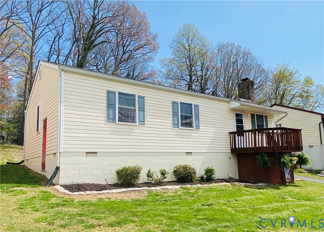 3408 Shady Creek Road North Chesterfield, VA 23234 - Photo 3 of 29 a front view of a house with a yard and potted plants