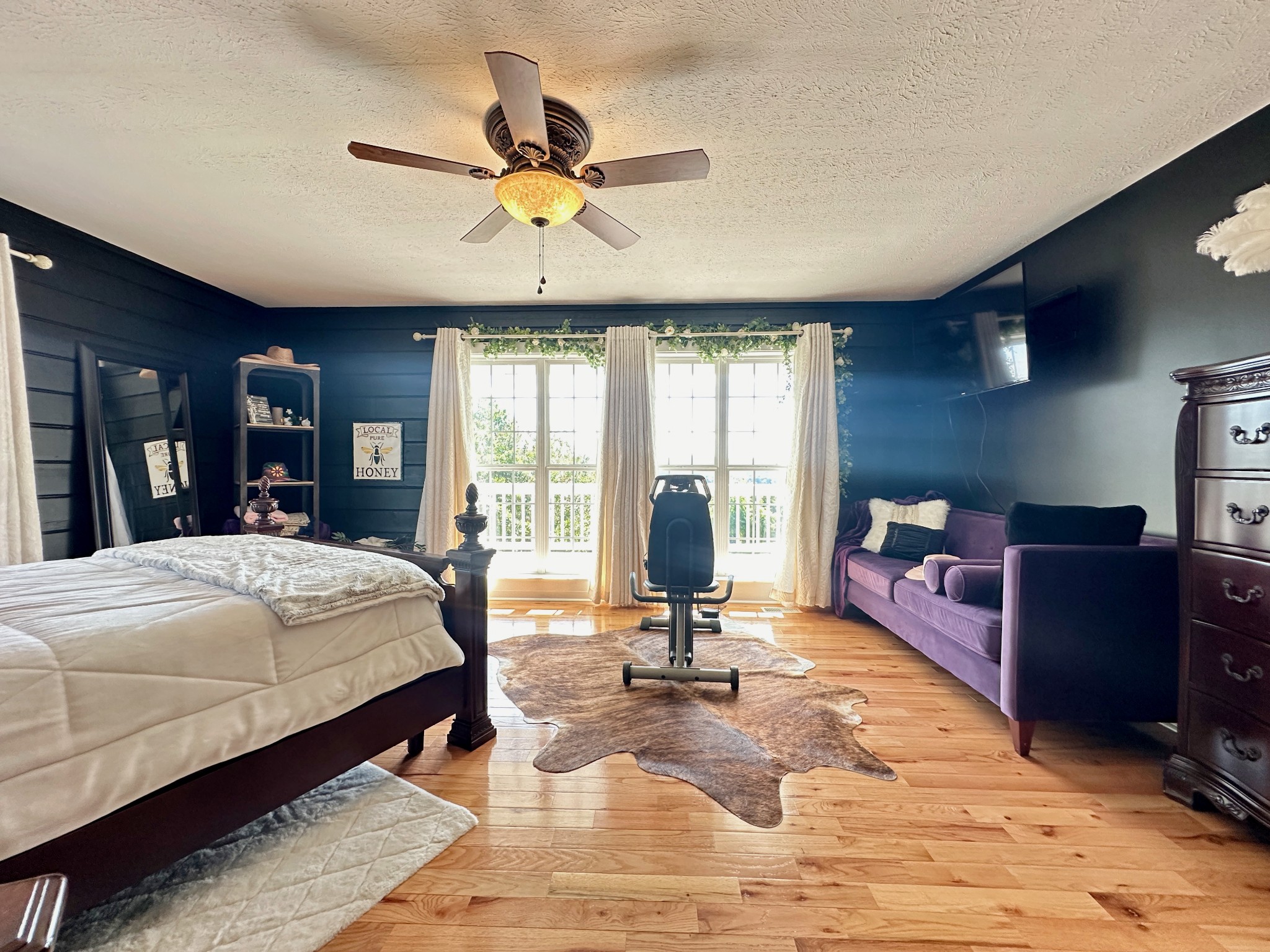 199 Knee Road Watertown, TN 37184 - Photo 22 of 70 a bed room with a bed and a large mirror
